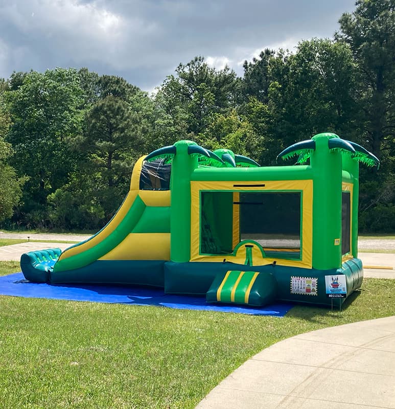 Palm Paradise Bounce House at a corporate event outside